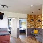 Mh Apartments