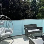 Rooftop Apartment With Balcony & Free Parking