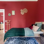 Colorful Apartment Facing Green Courtyard