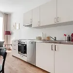 Colorful Apartment Facing Green Courtyard