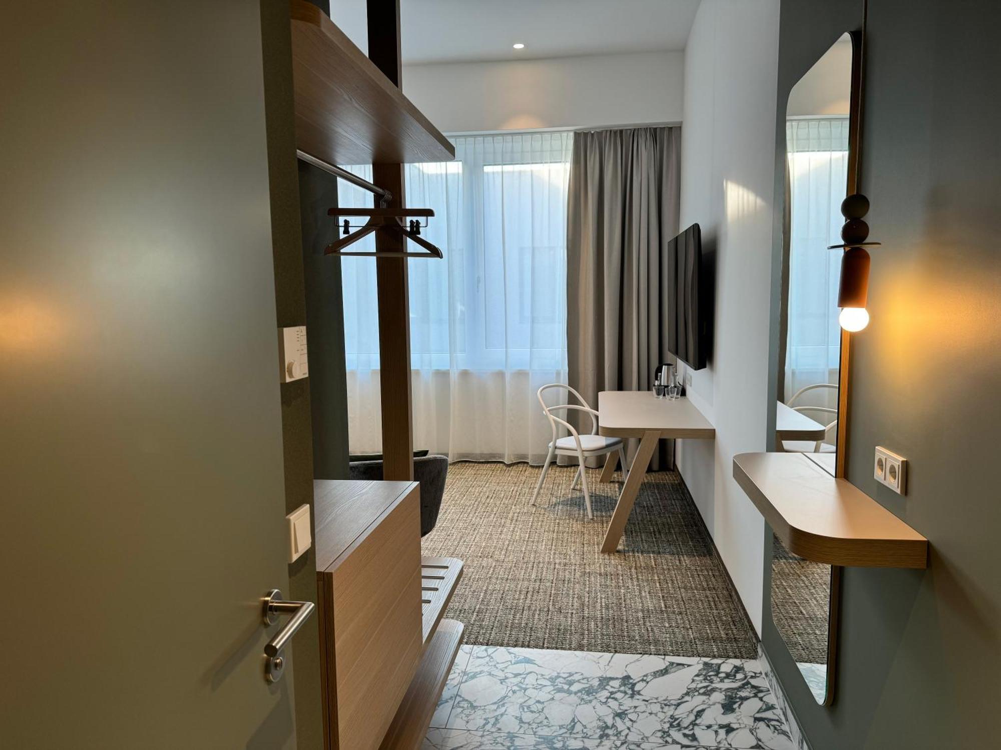 Hotel Arcotel Aq