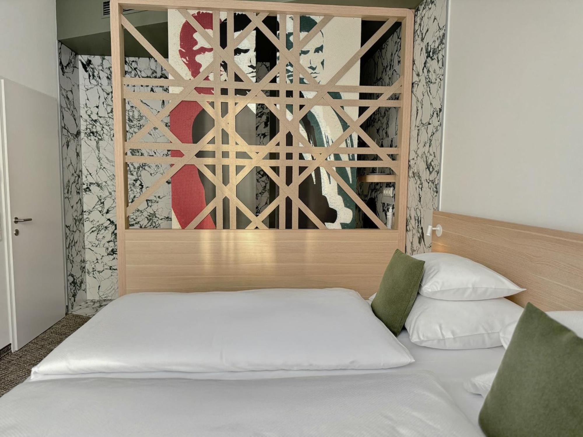 Hotel Arcotel Aq