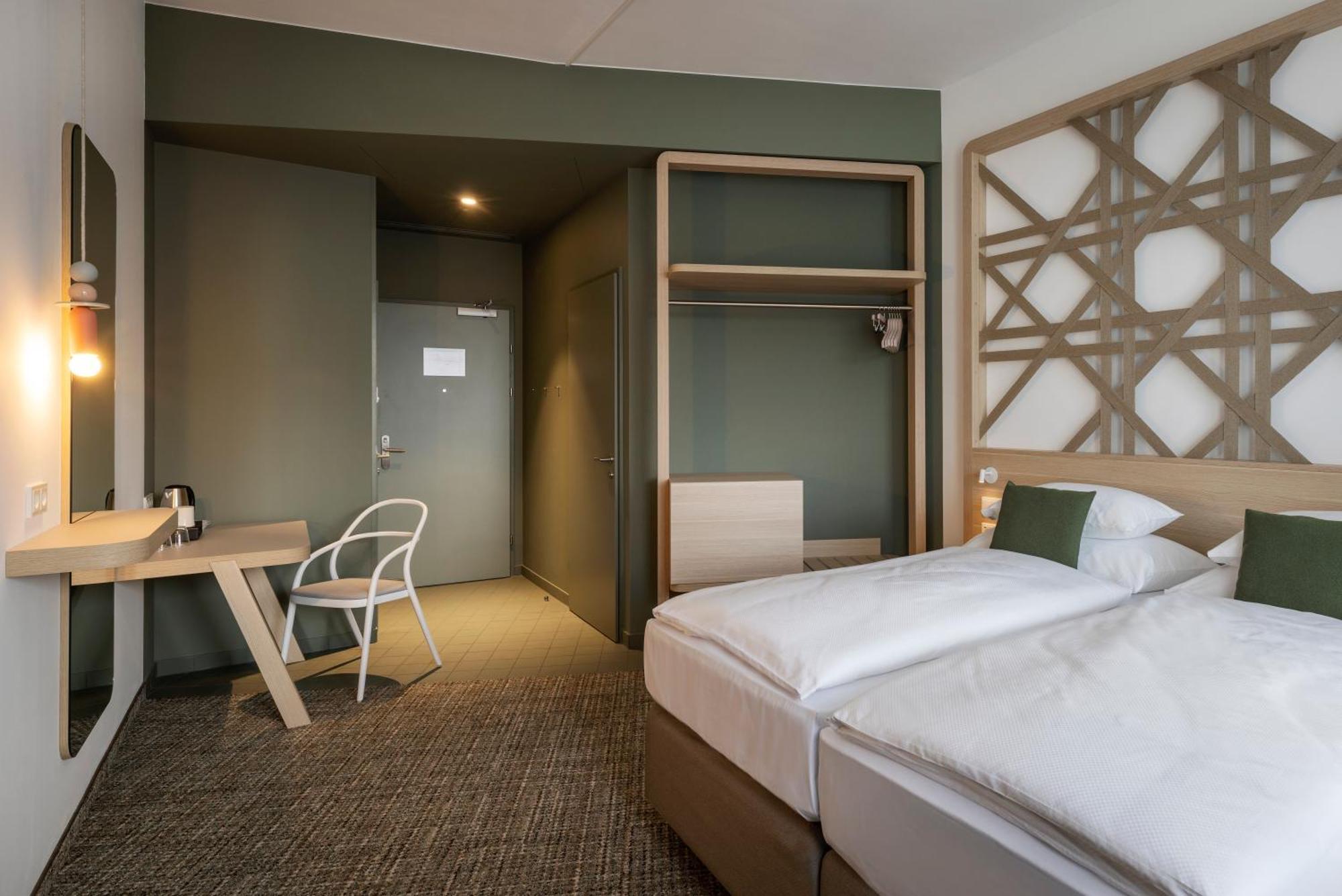 Hotel Arcotel Aq