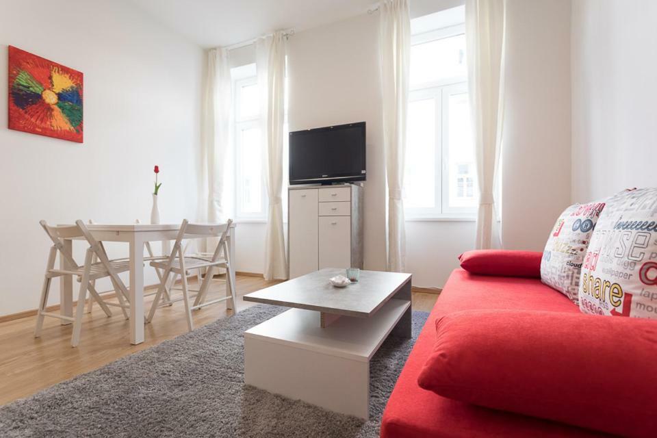 Bright Red Heart In Leopoldstadt Apartment