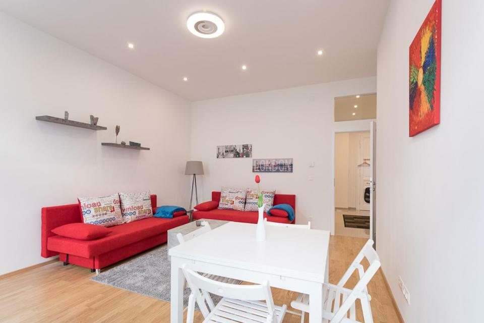Bright Red Heart In Leopoldstadt Apartment