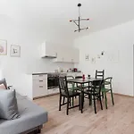 Colorful Apartment Facing Green Courtyard